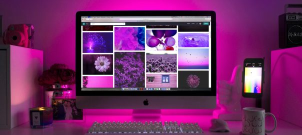 silver imac displaying collage photos