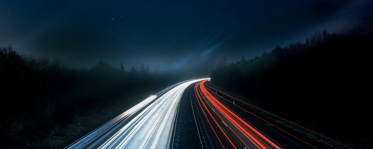 light trails on highway at night